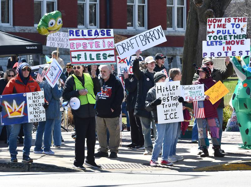Protestors displayed a wide variety of signs and attire during the No Kings rally on Saturday, March 28, 2026, in downtown Oregon, Illinois.