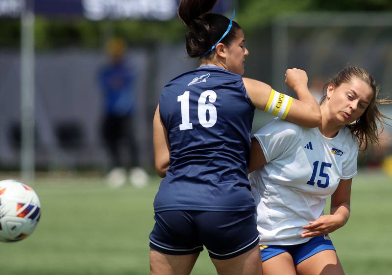 Johnsburg’s Lauren McQuiston, right, is defended by Willows Academy’s Maria Rodriguez in IHSA Class 1A Supersectional soccer action at Dominican University in River Forest on Saturday, May 31, 2025.