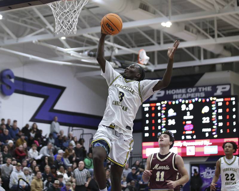 Yorkville Christian's Jayden Riley (3) puts in a lay up during their Plano Christmas Classic basketball game between Morris at Yorkville Christian Friday, Dec 26, 2025 in Plano.