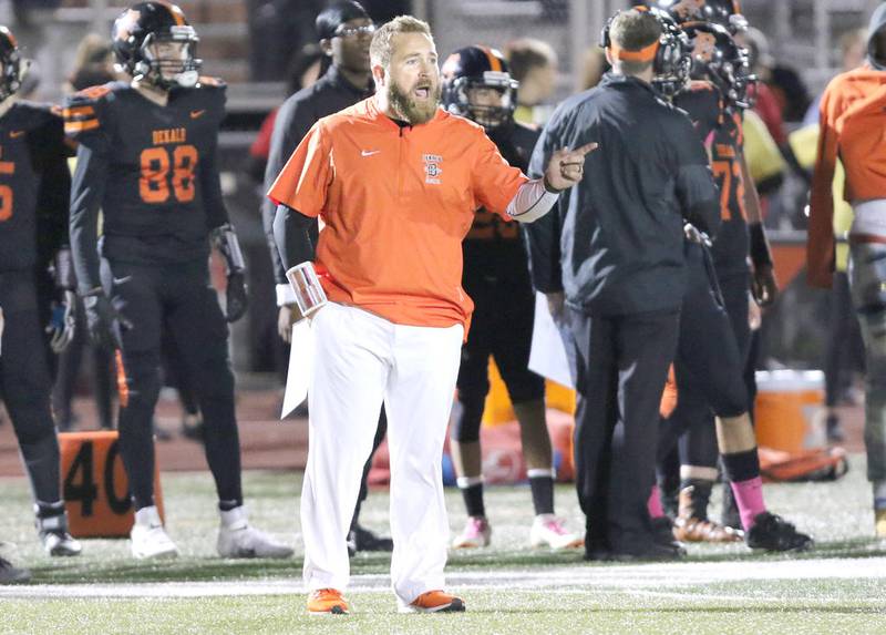 DeKalb head coach Keith Snyder yells instructions to his team during their 2019 game against Waubonsie Valley in DeKalb.