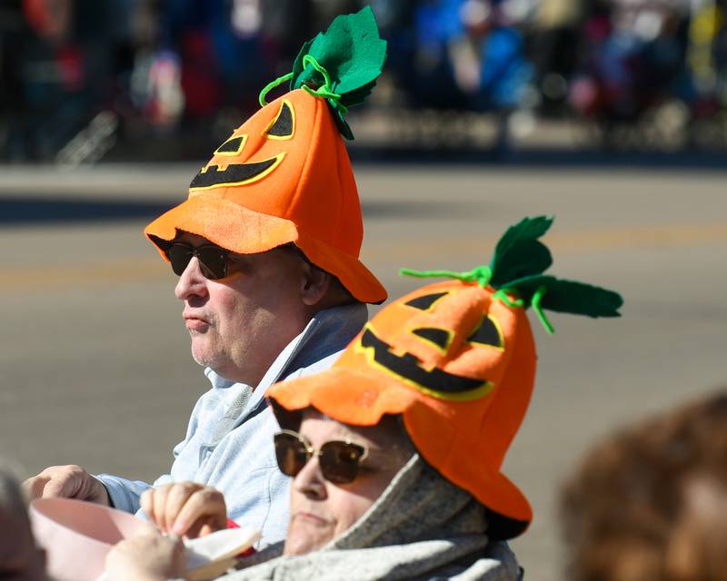 Debbie and Dave Terpin of DeKalb enjoy the weather before the start of the Pumpkin Parade on Sunday, Oct. 27, 2024, in downtown Sycamore.