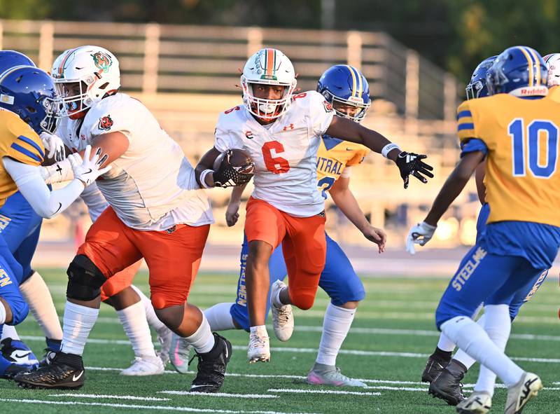 Plainfield East's David Croom (6) rushes the ball during the conference game against Joliet Central on Friday, SEP. 12, 2025, at Joliet.