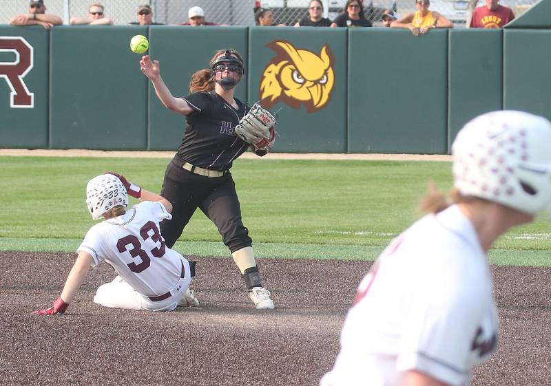 Serena's Lanee Cole throws to first base after forcing out LeRoy's Annie Conn at second during the Class 1A Supersectional game on Monday, June 2, 2025 at Illinois Wesleyan Univesity in Bloomington.