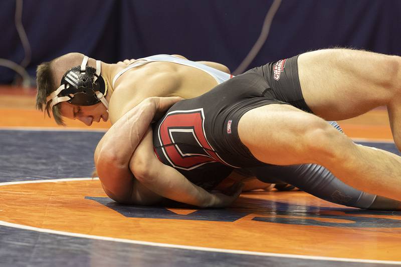 Marian Central’s Jimmy Mastny pins Orion’s Maddux Anderson in the 190 pound weight class of the 1A state individual wrestling finals Saturday, Feb. 22, 2025, at State Farm Center in Champaign.