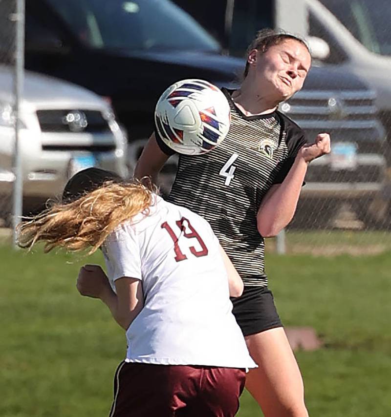 Morris' Skylar Sparks and Sycamore's Grace Amptmann go for a header during their Interstate 8 Conference Tournament semifinal game Wednesday, May 3, 2023, at Sycamore High School.