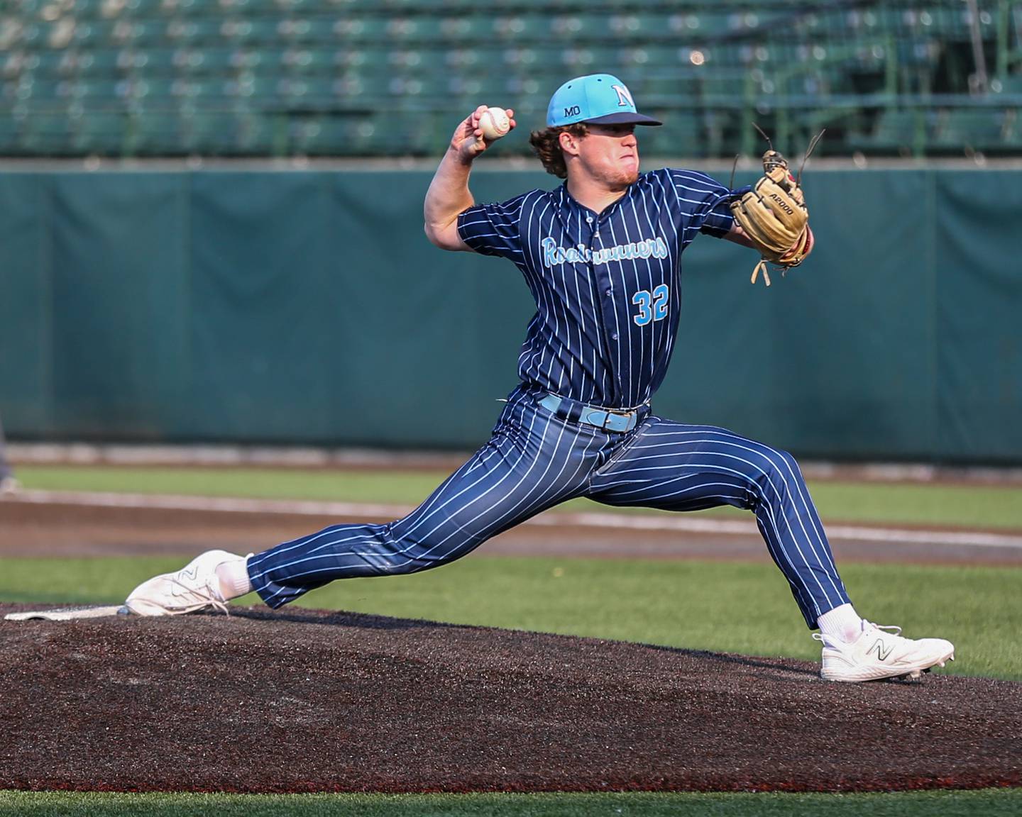 Nazareth's Finn O'Meara (32) delivers to the plate during Class 3A Crestwood Supersectional game between Lindblom at Nazareth.  June 5, 2023.