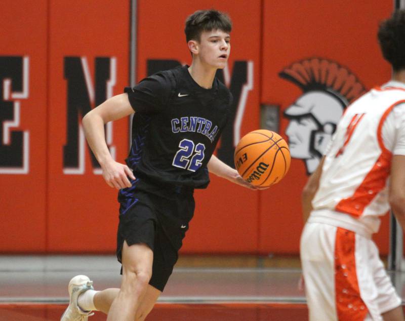 Burlington Central’s Joseph Cumpata moves the ball in varsity boys basketball on Friday, Dec. 5, 2025, at McHenry Community High School in McHenry.