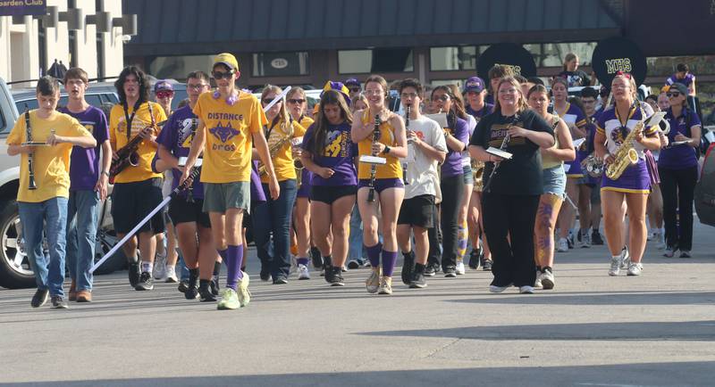 Members of the Mendota High School Band march down Indiana Avenue during the homecoming parade on Friday, Oct. 3, 2025