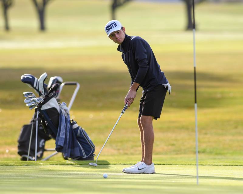 Gavin Baxa of Plainfield South watches his putt during the Plainfield Central regional on Wednesday Oct. 1, 2025, held at Wedgewood Golf Course in Plainfield.