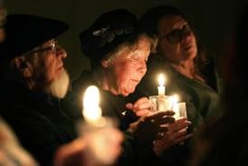 Photos: DeKalb church holds vigil to promote peace, remember lives lost in ICE related shootings in Minnesota