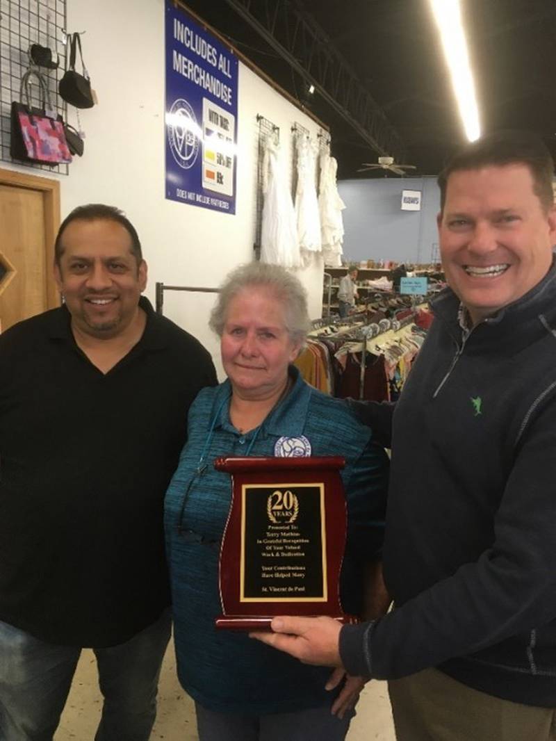 Gerardo Serna, Terry Mathias, and Morris Mayor Chris Brown.