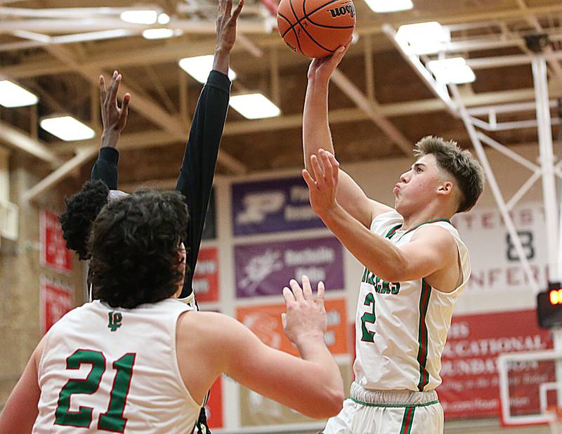 L-P’s Seth Adam’s (2) shoots a shot over Oak Forest during the Dean Riley Shootin’ The Rock Tournament on Monday, Nov. 21, 2022 at Kingman Gymnasium.