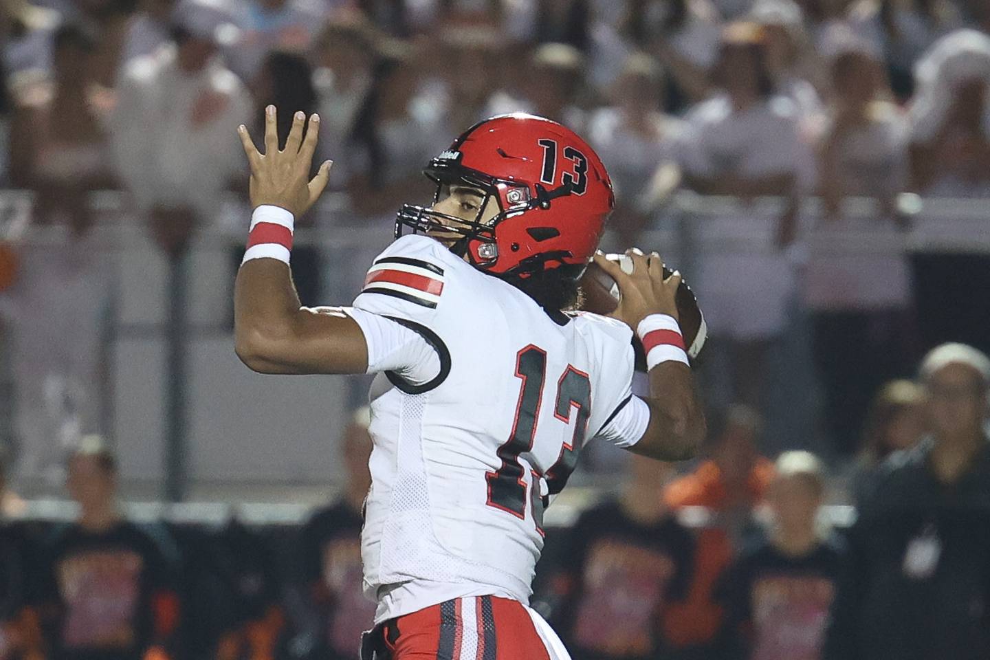 Bolingbrook’s Jonas Williams finds Chico Thomas for a 73-yard touchdown pass against Lincoln-Way West on Friday, Sept. 22, 2023, in New Lenox.