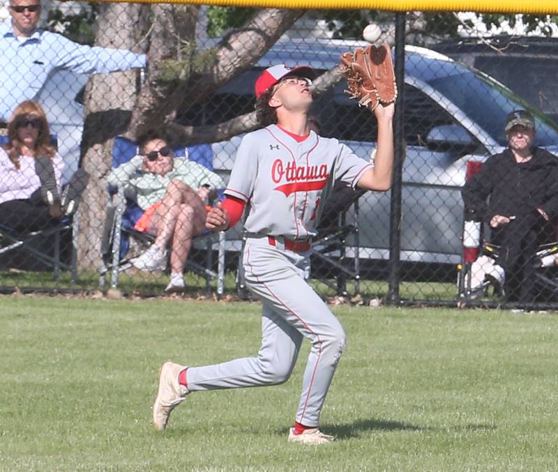 Ottawa's Julian Alexander makes a catch on the run against Rock Island during the Class 3A Regional semifinal game on Thursday, May 25, 2023 at Morris High School.