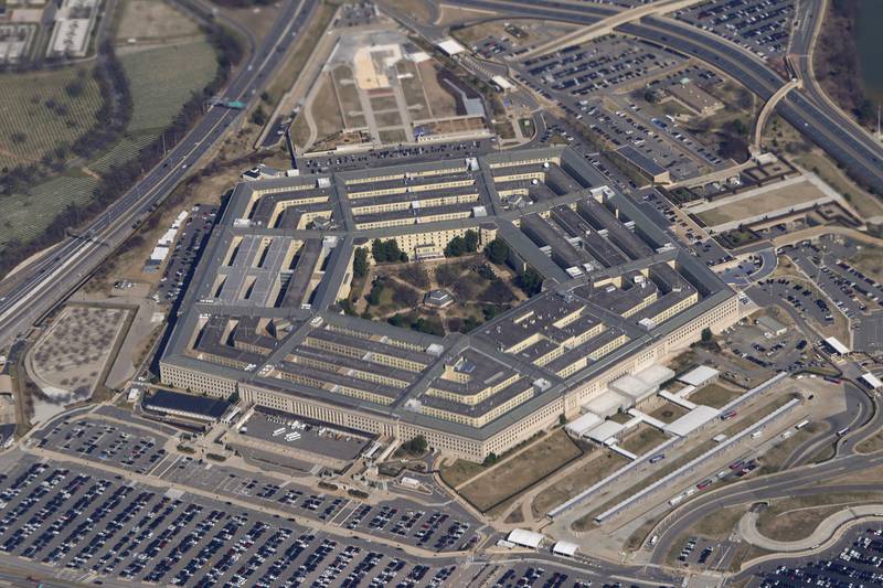 FILE - The Pentagon is seen from Air Force One as it flies over Washington, March 2, 2022. A fake image purportedly showing an explosion near the Pentagon has been widely shared on social media, sending a brief shiver through the stock market. But police and fire officials in Arlington, Va., said Monday, May 22, 2023, that the image isn't real and there was no incident at the U.S. Department of Defense headquarters. (AP Photo/Patrick Semansky, File)