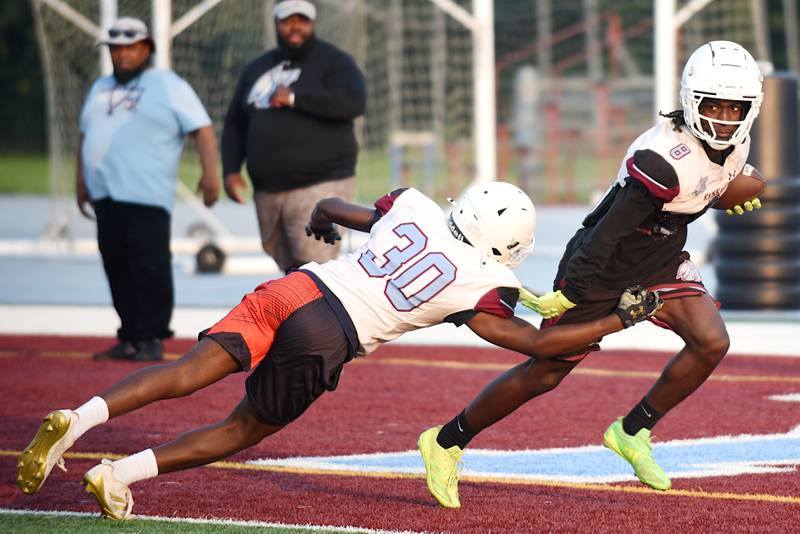 Kankakee's Kymani Billings, right, evades Omari Houston during a scrimmage at the Kays' summer camp Thursday, July 31, 2025.