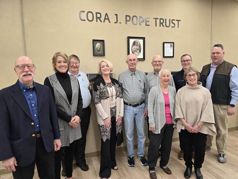 The Cora J. Pope Trust and the Ottawa YMCA announced a new collaboration aimed at helping seniors. Pictured are Cora J. Pope Trust Board members (from left) Jim Keely, board attorney; Karen Trafton, Gordon Page, Erin Stuedemann, Spencer Lawrence, Ralph Wolter, Claudia Rogers, treasurer; Gayle Schmitt, the Rev. Pastor John Walter of First Presbyterian Church; and the Rev. James Friesen of First Presbyterian Church of Morris.