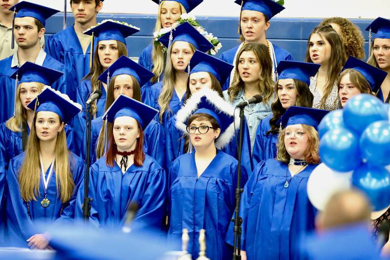 The PHS choir sings during commencement ceremonies in Prouty Gym Saturday.