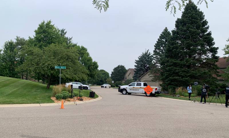 Law enforcement and media outlets gather Wednesday, Aug. 9, 2023, at Wild Plum and White Ash roads near Crystal Lake where the McHenry County Sheriff's Office said four people were shot and it was conducting a death investigation.