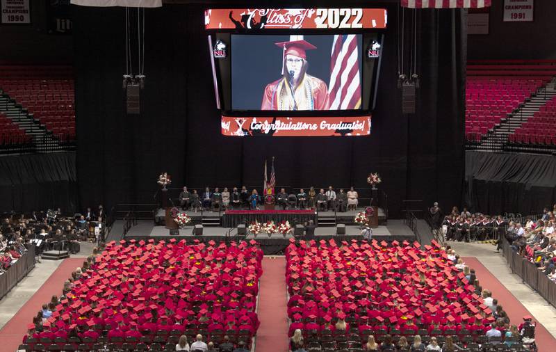 Salutatorian Jenna Buss welcomes her fellow graduates and their families during Yorkville High School's class of 2022 graduation ceremony at the NIU Convocation Center on Friday, May 20, 2022.