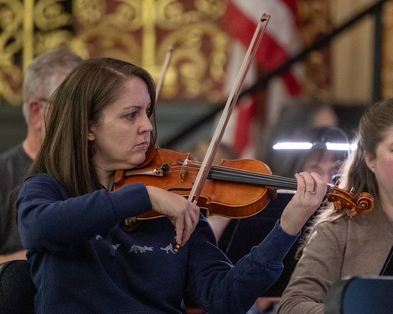 Violinist of the Illinois Valley Symphony Orchestra plays during the performance of the "Nutcracker" on Monday, December 8, 2025 in the Matthiessen Memorial Auditorium at LaSalle-Peru Township High School in LaSalle.