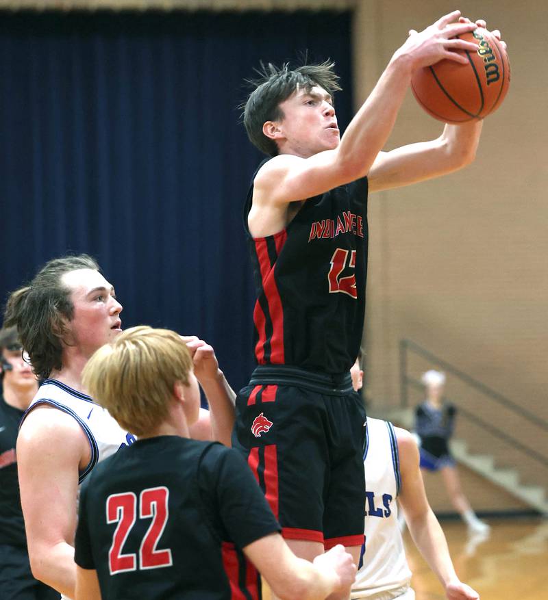 Indian Creek's Jakob McNally grabs a rebound in front of Hinckley-Big Rock's Martin Ledbetter during their game Tuesday, Jan. 31, 2023, in the Little 10 Conference Basketball Tournament at Somonauk High School.