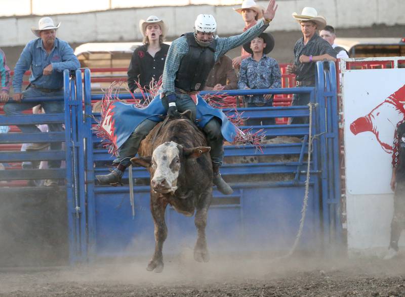Jaden Gardner of Bloomington, rides a bull during the inaugural Starved Rock Rodeo on Saturday, June 21, 2025 at the La Salle Speedway.