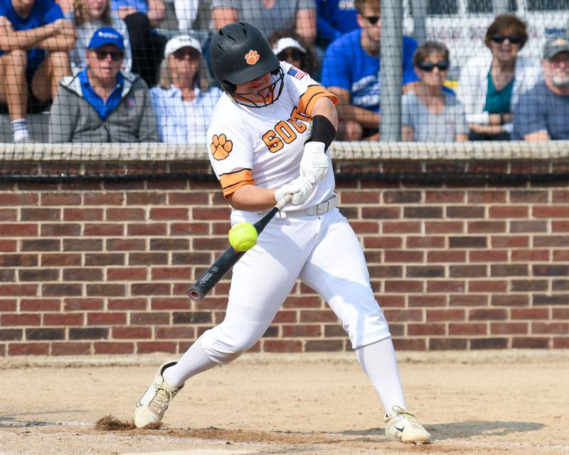Wheaton Warrenville South's Lily Bobor (19) makes contact with the ball where she got two base hit during the sectional semifinal game while taking on Weaton Warrenville South on Thursday June 5, 2025, held at Oswego High School.