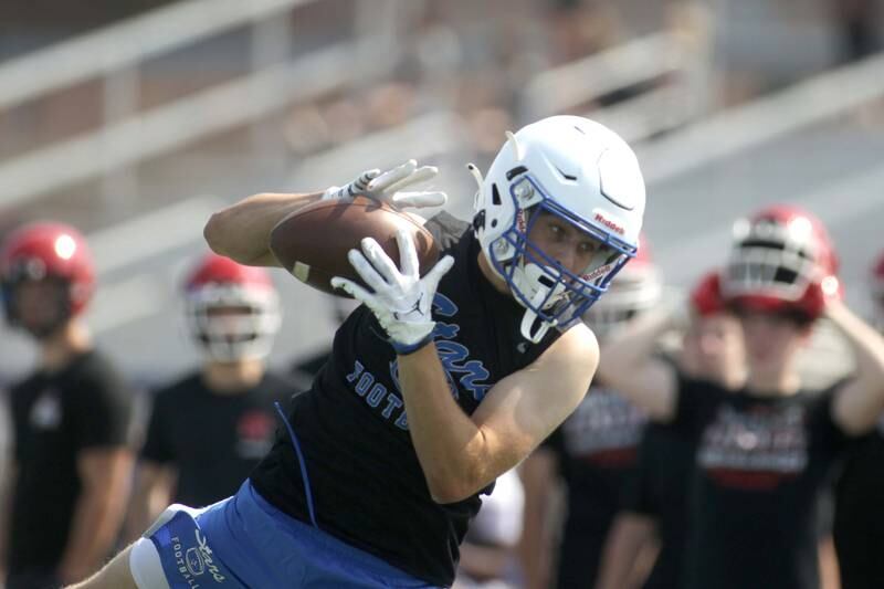 St. Charles North’s Jaden Harmon makes a catch during a 7-on-7 football game against Yorkville at St. Charles North on Thursday, June 22, 2023.