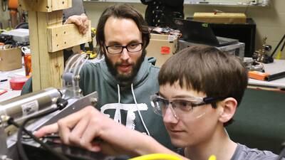 Going pro: DeKalb High School math teacher helps students build robots competitively 