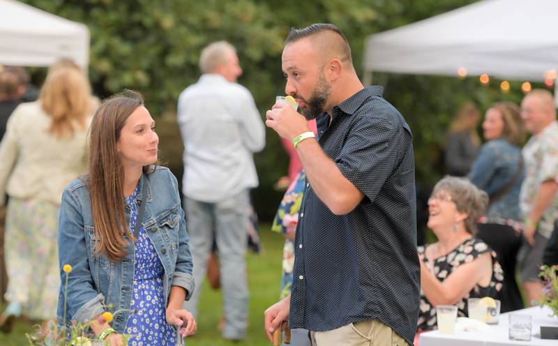 Lauren and Ryan Quinn attend the Batavia MainStreet holds their annual Cocktails in the Park in Batavia on Saturday, July 22, 2023.