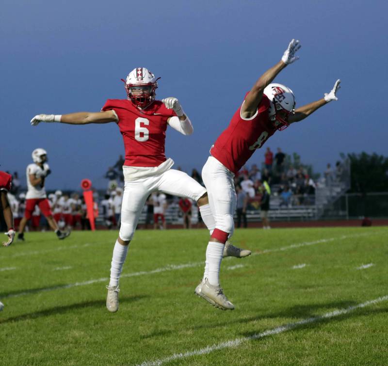 Brian Hill/bhill@dailyherald.com
South Elgin's Kyle Steinhofer (6) and \Mason Montgomery (8) celebrate a first quarter touchdown against Glenbard East Friday September 2, 2022 in South Elgin.