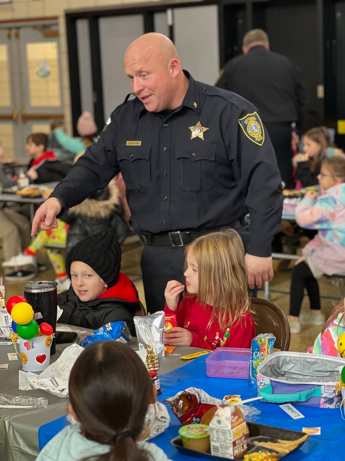 Ottawa Police Chief Brent Roalson meets with Jefferson Elementary School's Champions of the Charter for December 2022.