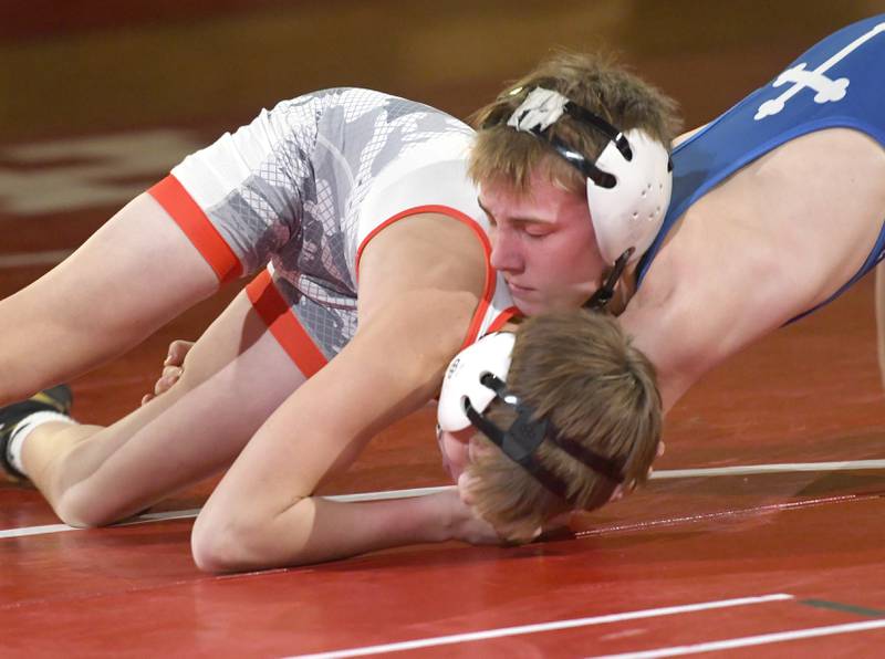 Newman's Tyler Grennan (right) wrestles Oregon's Kayden Cover at 106 pounds during the Oregon Quad meet on Saturday, Jan. 17, 2026 at the Blackhawk Center in Oregon.
