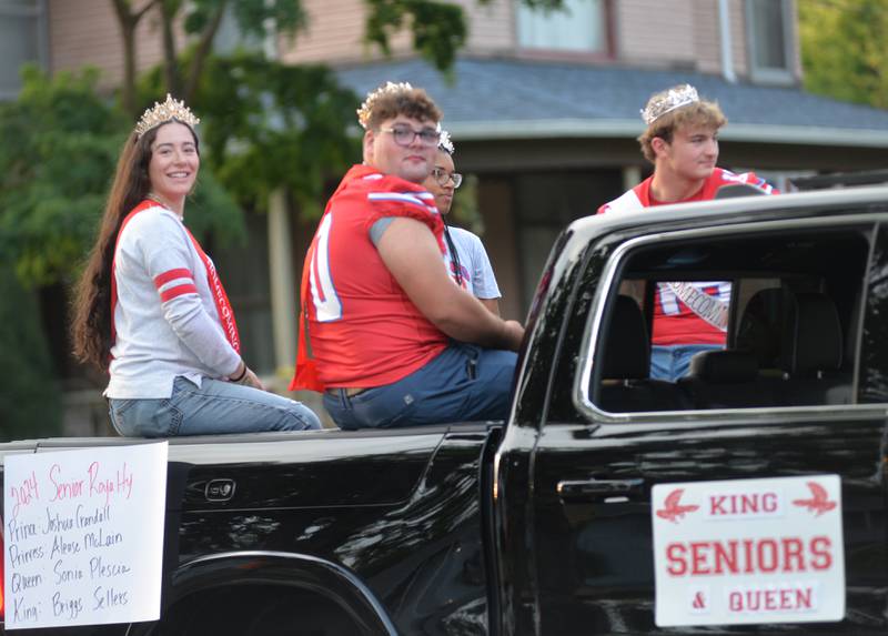 Oregon High School Homecoming Seniors: Queen Sonya Plescia, King Briggs Sellers, Princess Alease McLain, and Prince Josh Crandall ride in the homecoming parade on Wednesday, Sept. 18, 2024.