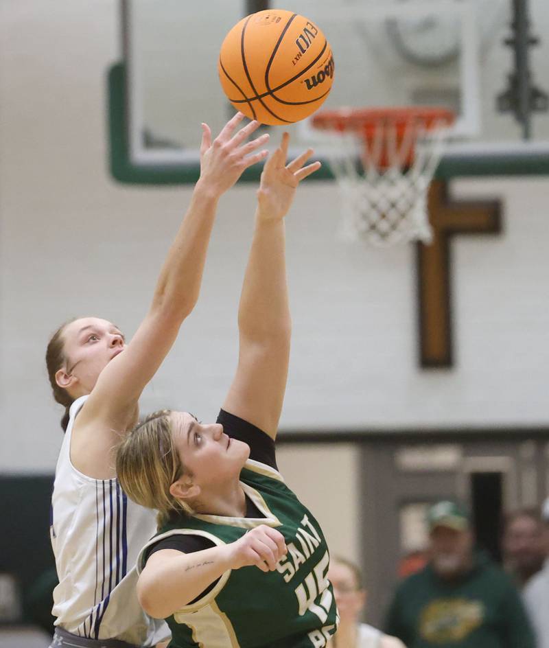 St. Bede's Savannah Bray wins the opening tip over Princeton's Keighley Davis during the Class 2A Regional semifinal game on Tuesday, Feb. 17, 2026 at St. Bede Academy.