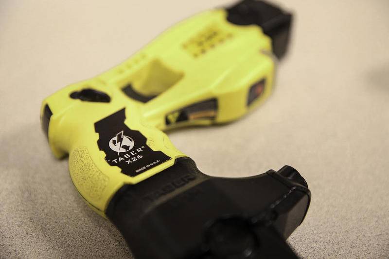An X26 Taster sits on a table Thursday, Oct. 26, 2017, at the Joliet Police Department in Joliet, Ill. The department recently received 25 new Tasers.