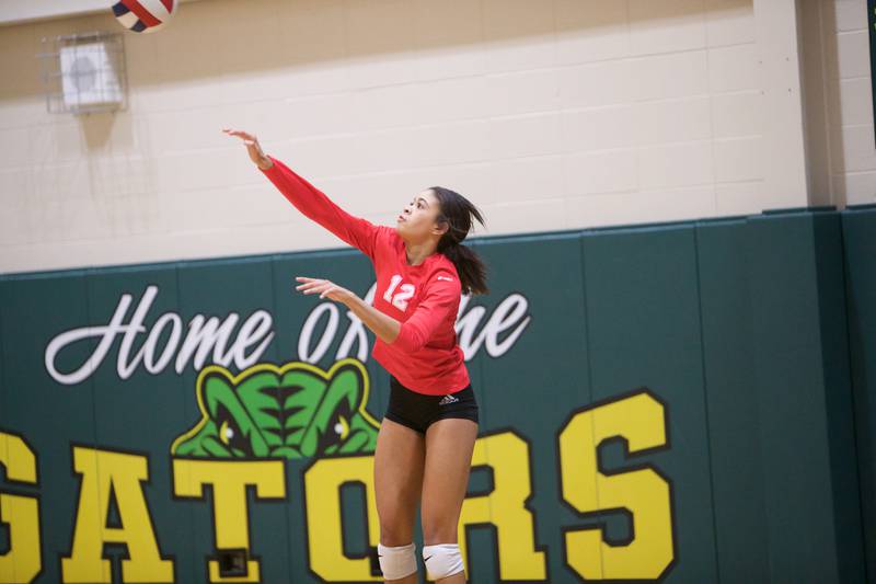 Huntley's Morgan Jones serves for a point against Crystal Lake South on Thursday, Oct. 20, 2022 in Crystal Lake.