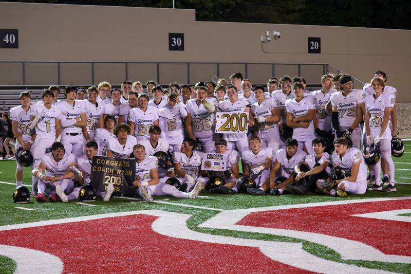 Sycamore’s football team poses for picture after win against L-P on Friday, October 11, 2024 at Howard Fellows Stadium in LaSalle.