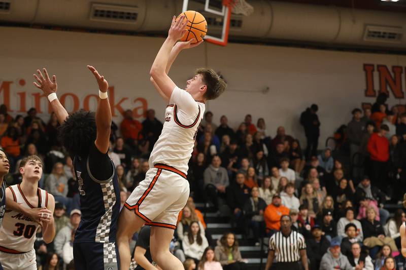 Minooka’s Kyle Rodak puts up a shot against Oswego East on Friday, Jan. 16, 2026 in Minooka.