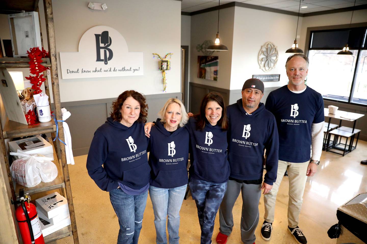 (Left to right) Co-owner Julie Martin, Krissy Peterson, co-owner Dawn Phillips, Roberto Moncada and co-owner Jeff Martin opened the Brown Butter Cafe and Bakery in St. Charles a few weeks ago. Along with making baked goods like allergy free donuts, the cafe serves breakfast and lunch.