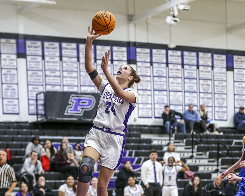 Plano's Chloe Rowe (24) puts in  lay up during their basketball game between Johnsburg at Plano, Monday Dec 16, 2024 in Plano.