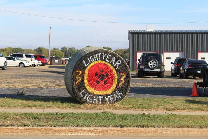 Round and round: Mason Smith Auto Repair was inspired by the tire company depicted in Disney-Pixar's "Cars" movie series for their bale decoration – Lightyear being a parody of Goodyear tires. The bale was part of the 2025 Hay Bale Trail in Rochelle throughout October.