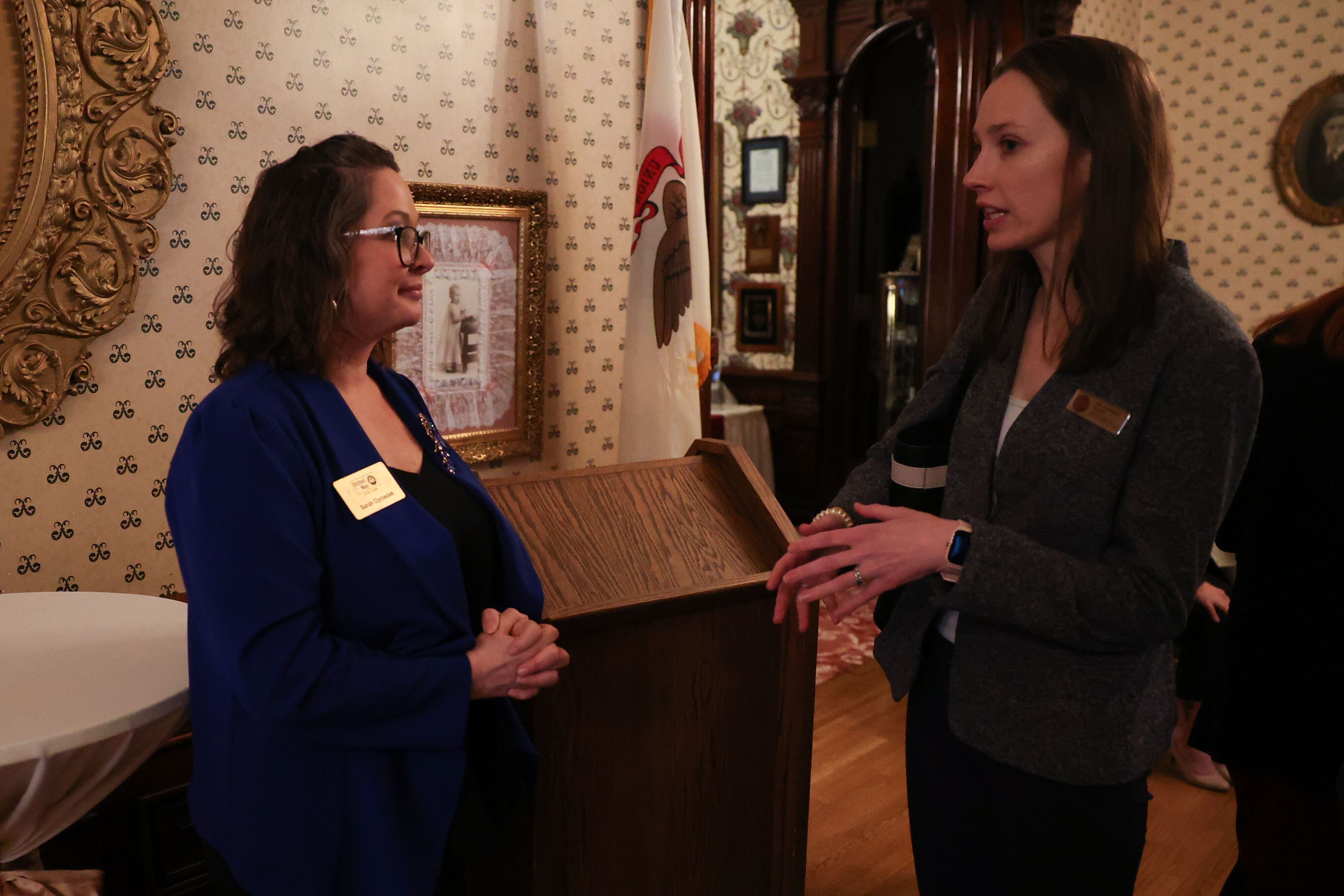 Sarah Oprzedek, United Way of Will County CEO, talks with Lewis University professor Dr. Hannah Klein a United Way private event at the Jacob Henry Mansion on Thursday, February 23rd, 2023 in Joliet.