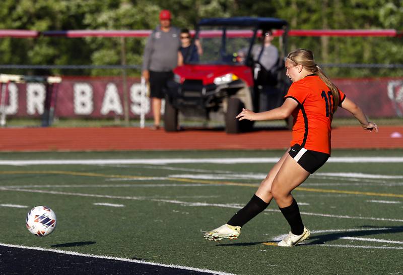 Crystal Lake Central's Brooklynn Carlson kicks the game winning shootout gaol during a Class 2A Deerfield Sectional semi-final match against Lake Forest on Tuesday, May 21, 2024, at Deerfield High School.