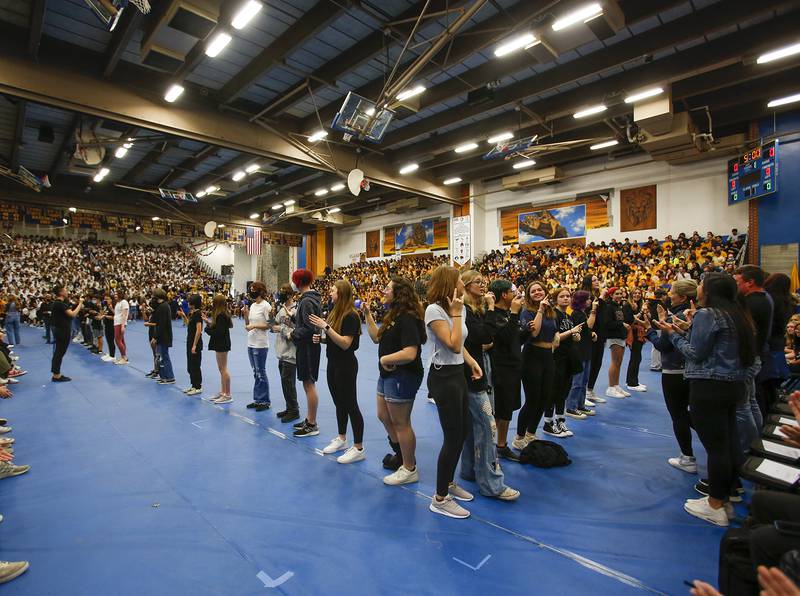 The Lyons Township pep band performs the school song during an all-school assembly in La Grange on Friday, April. 22, 2022.