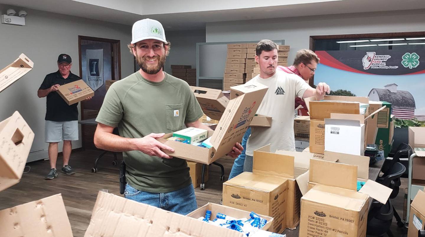 Kendall-Grundy Young Leaders pack school supply kits for Plano School District 88 kindergartners.