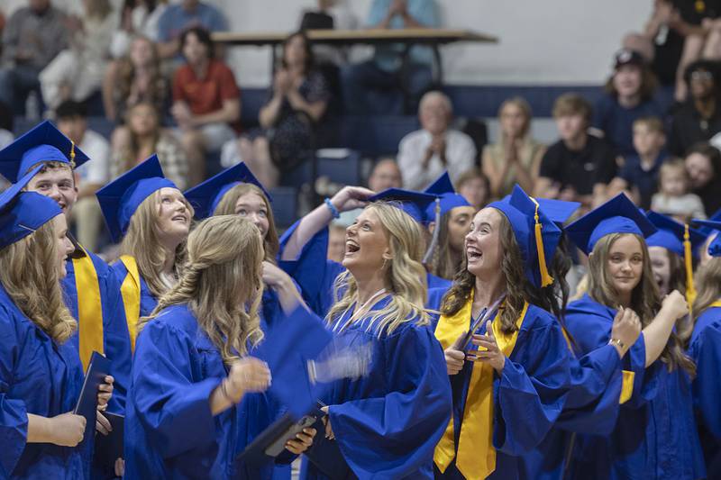 Graduates celebrate flowing receiving their diplomas Wednesday, May 17, 2023 at Newman High School.