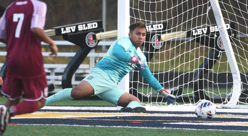 Elgin goalkeeper Carlos Benitez makes sure the ball stays clear of the net during Tuesday’s IHSA class 3A sectional semifinal boys soccer game against Huntley in Round Lake.