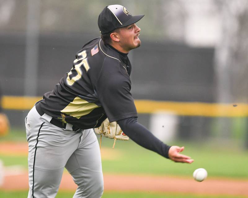 Sycamore's Evan Munch (25) tosses the ball over to first base for an out during the game on Thursday May 1, 2025, while traveling to take on Kaneland High School.